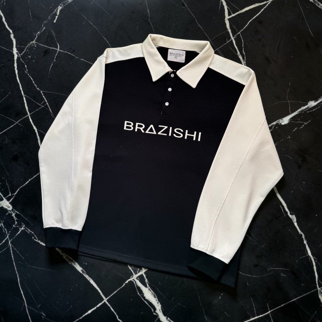 Black and IVORY rugby shirt with 'BRAZISHI' branding on a dark marble background
