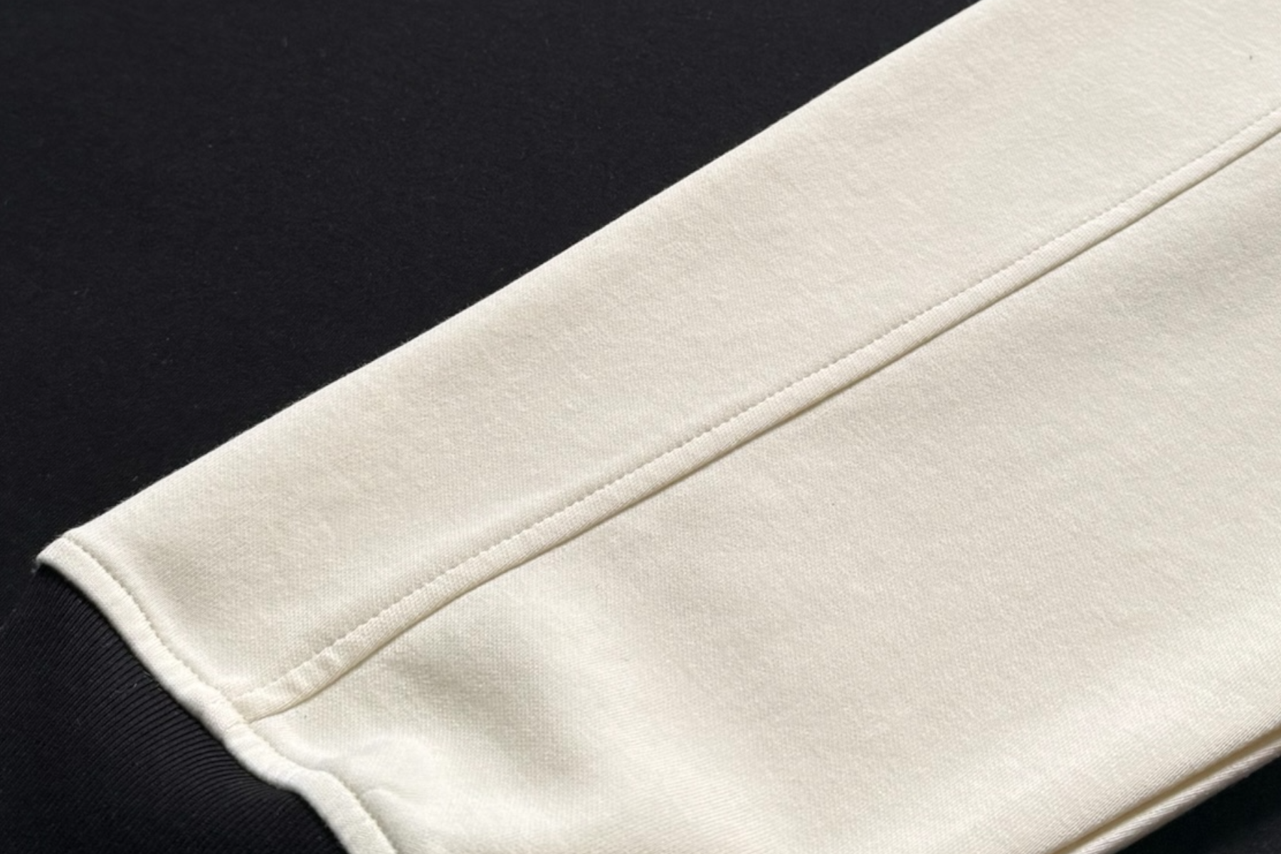 Black and ivory rugby shirt with 'BRAZISHI' branding on a dark surface